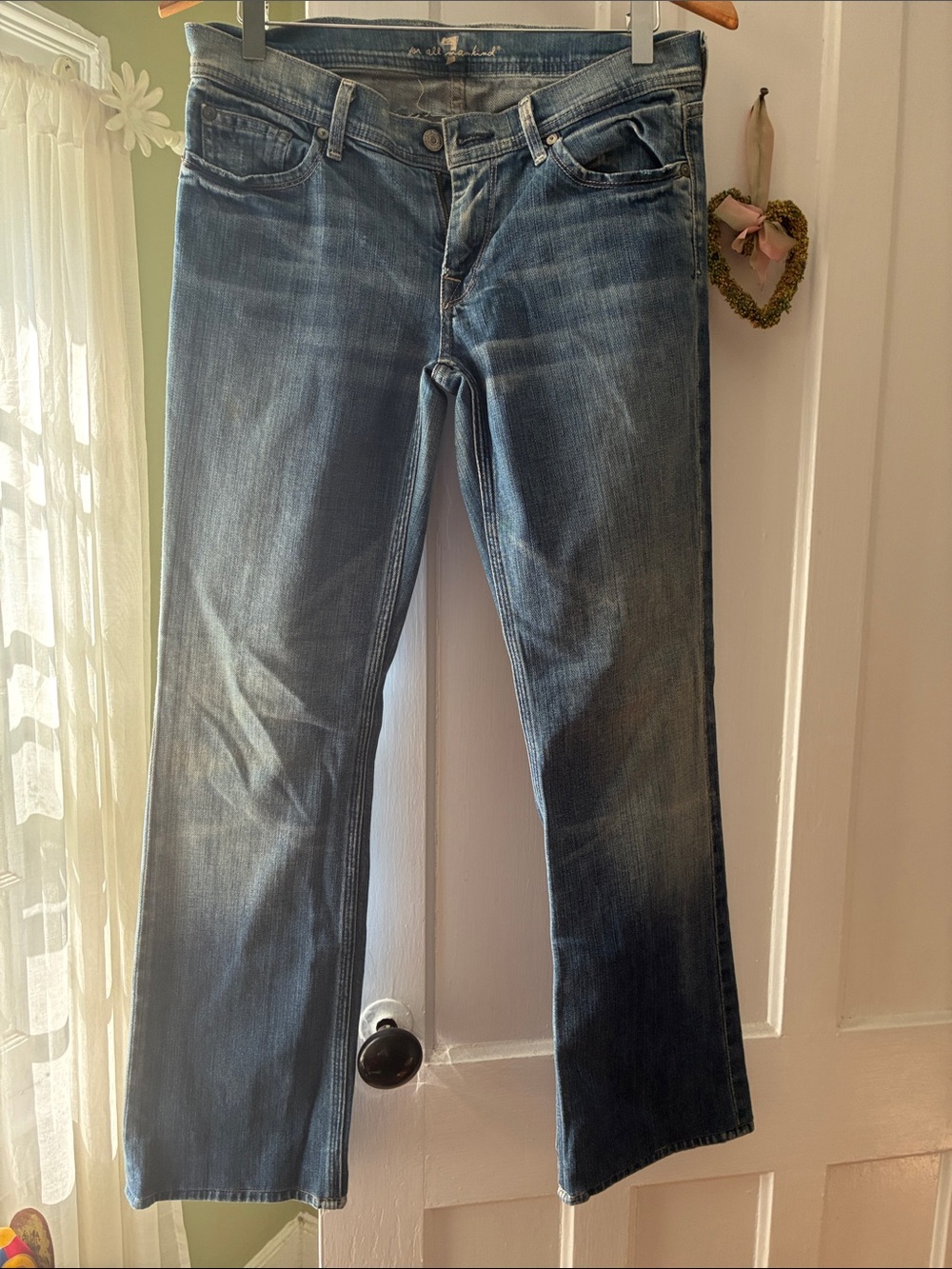 7 For All Mankind Women’s  Faded Blue Bootcut Jeans
